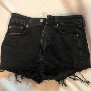 Distressed black denim shorts